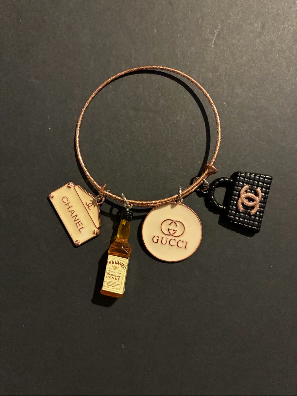Designer-Inspired Gold Charm Bracelet with Black and Cream Accents